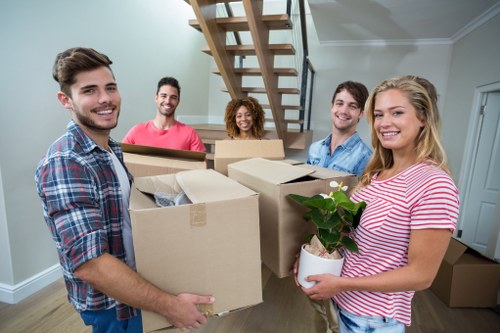 Removal team handling boxes during an Elephant and Castle home move