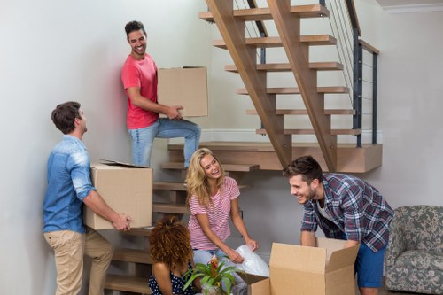 Packed boxes and furniture ready for a man and van move in South London