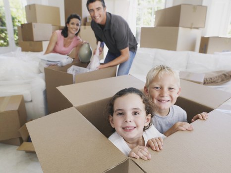 Removal team handling boxes and furniture in Elephant and Castle