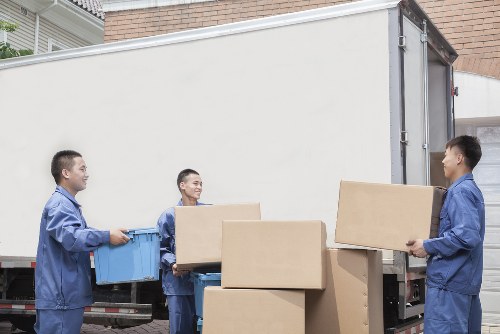 Packing boxes and furniture for a removals van in Elephant and Castle