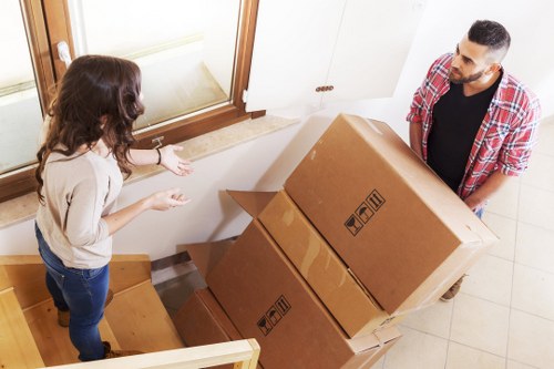Packing boxes and furniture ready for a flat move in South London
