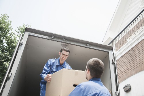 Business relocation equipment and packed boxes ready for a commercial move